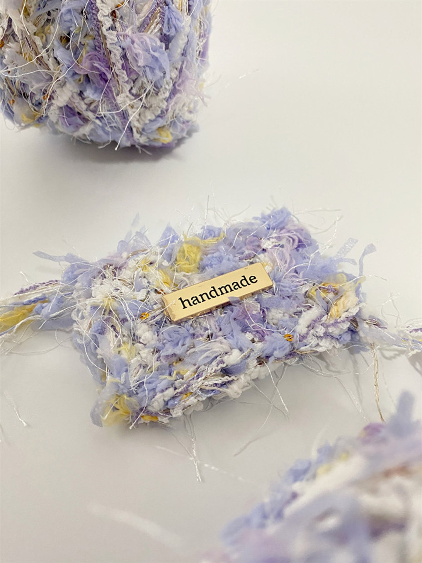 Close up texture of Lilac Breeze soft purple textured yarn