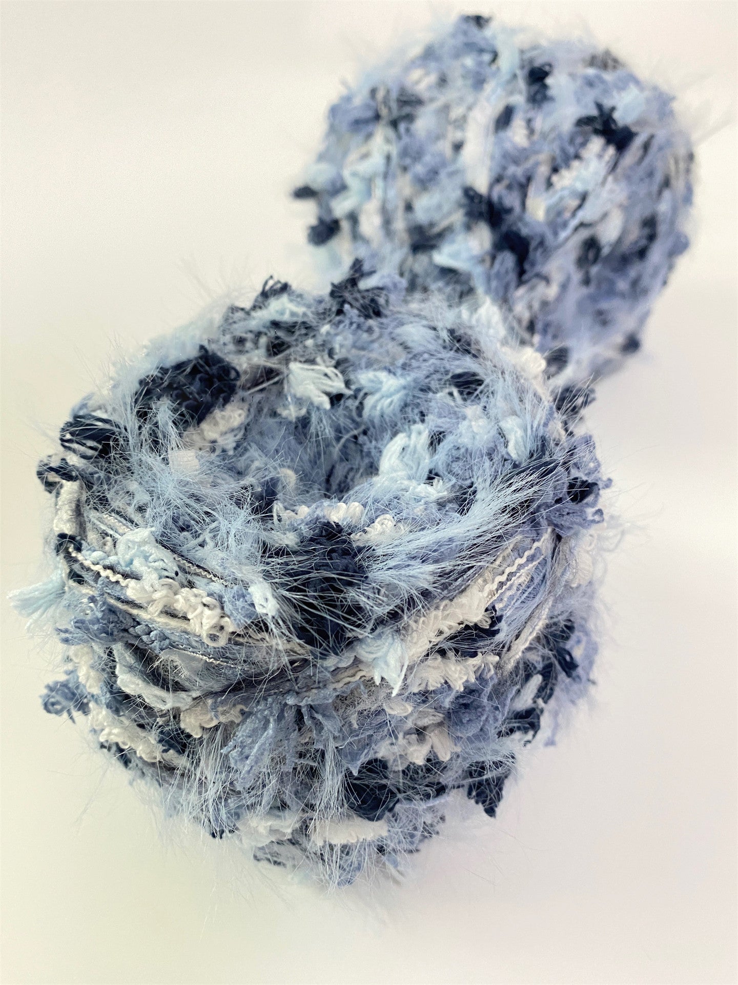 Frost Lake icy blue yarn with soft white details